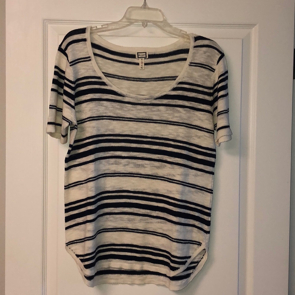 Nubby light- weight knit sweater.